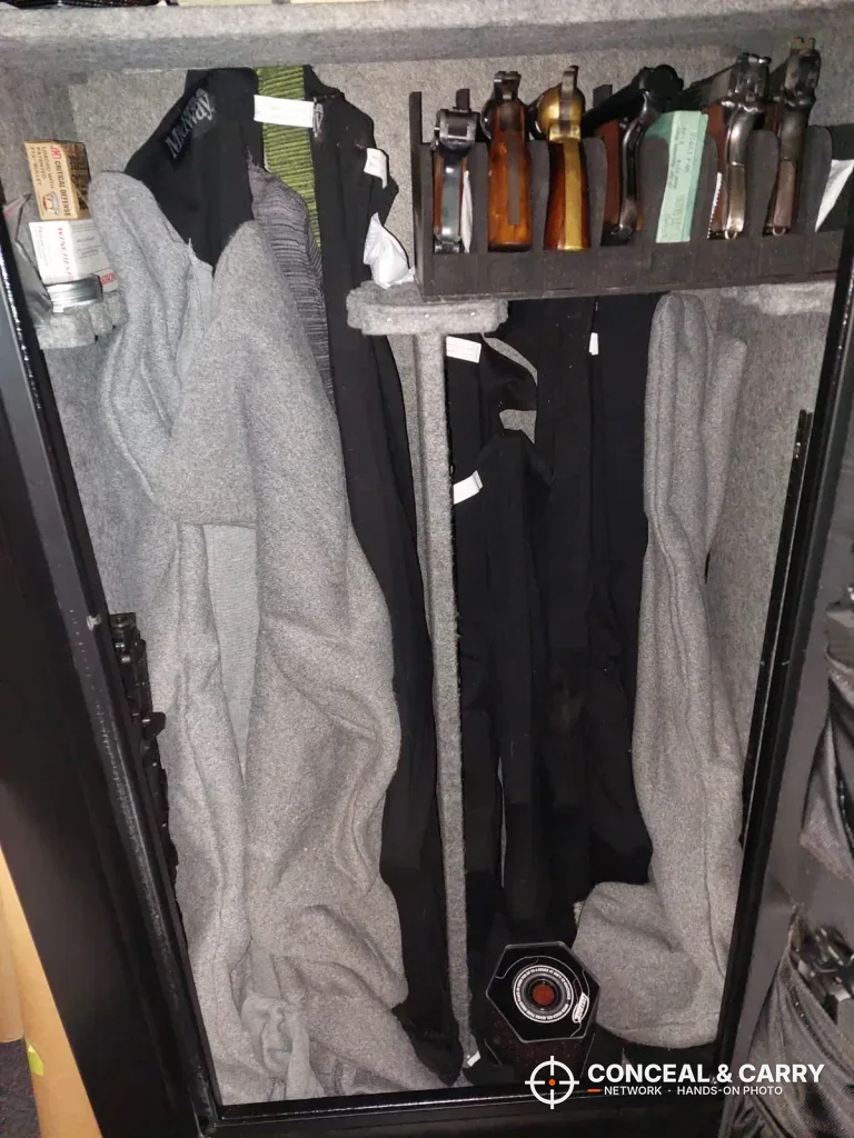 Inside the Kodiak KBX5629 with a loaded top shelf and gray and black covers below