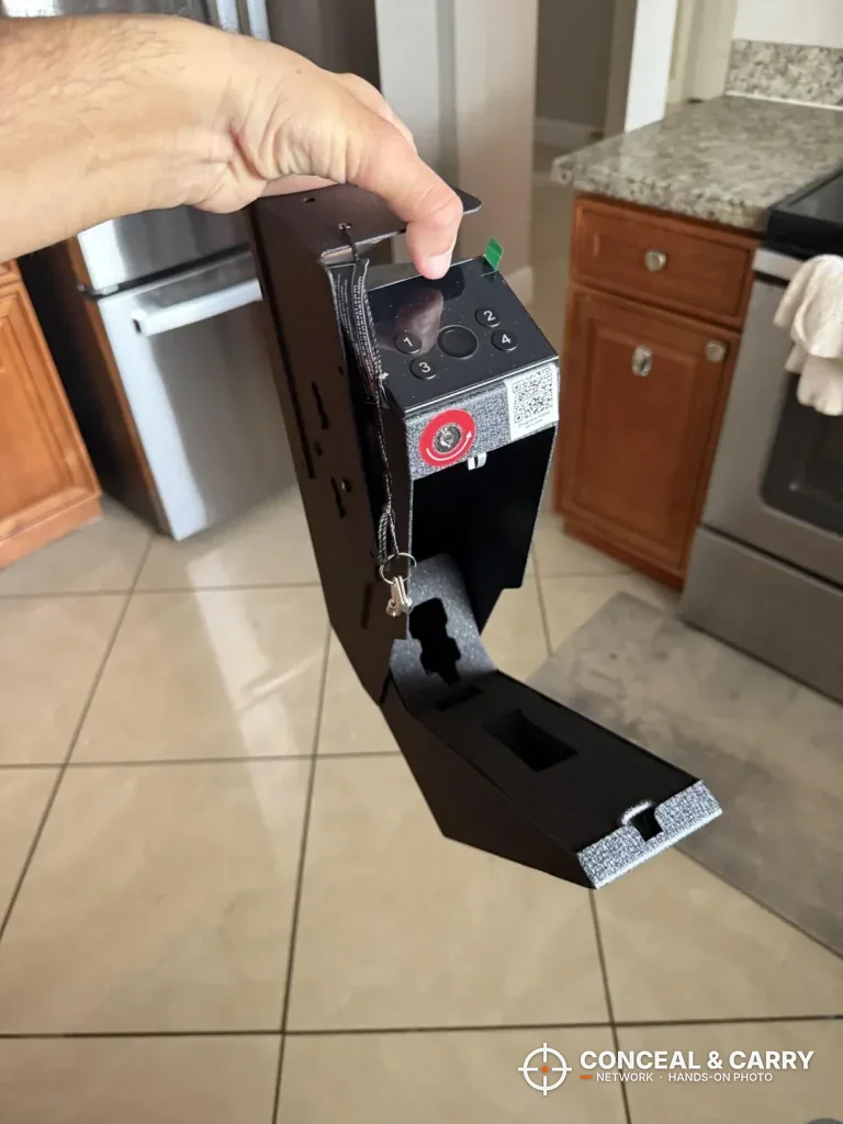 KornerBatl safe held up with the drop-down drawer swung open