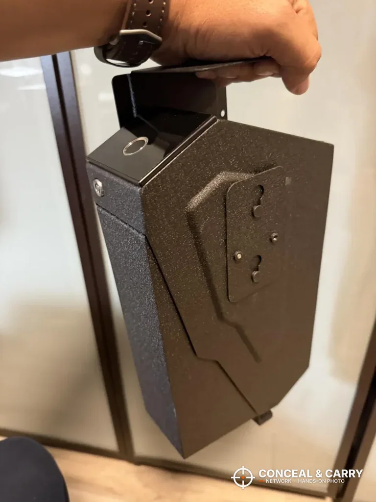 KornerBatl safe carried by its bracket, showing the textured side panel