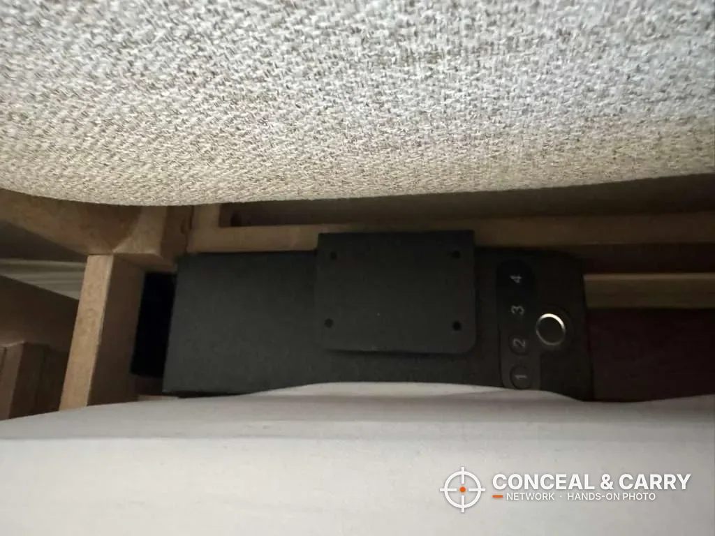 Langger slider safe mounted on its side in the gap beside a mattress