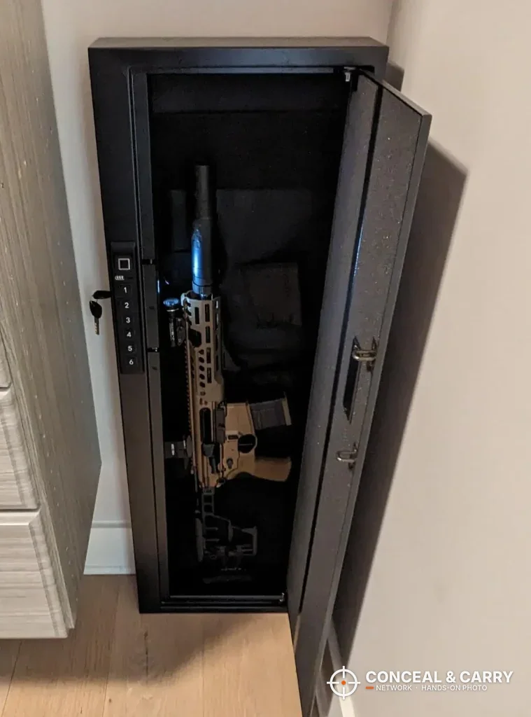Langger compact biometric long gun safe open with a tan rifle standing inside