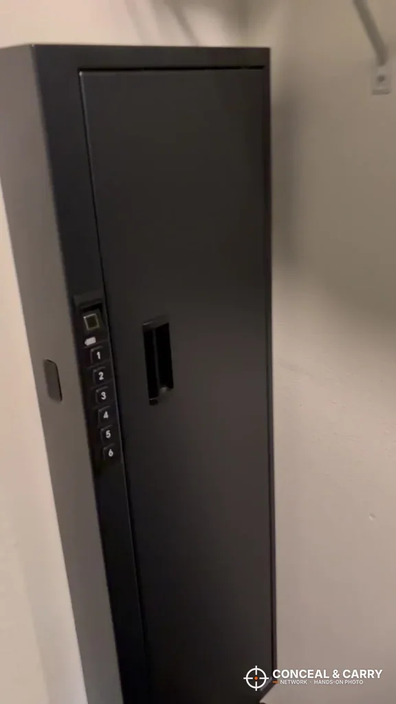 Langger compact long gun safe on the wall with the keypad strip and recessed handle