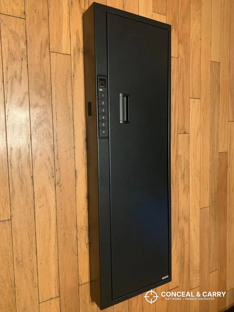 Langger compact long gun safe lying flat and closed on a hardwood floor