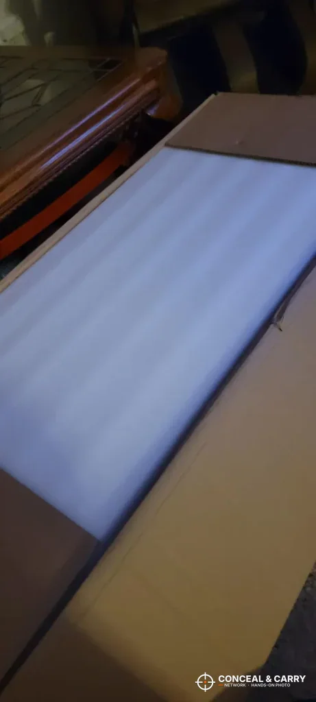 White foam layer on top of the Langger under-bed safe in the box