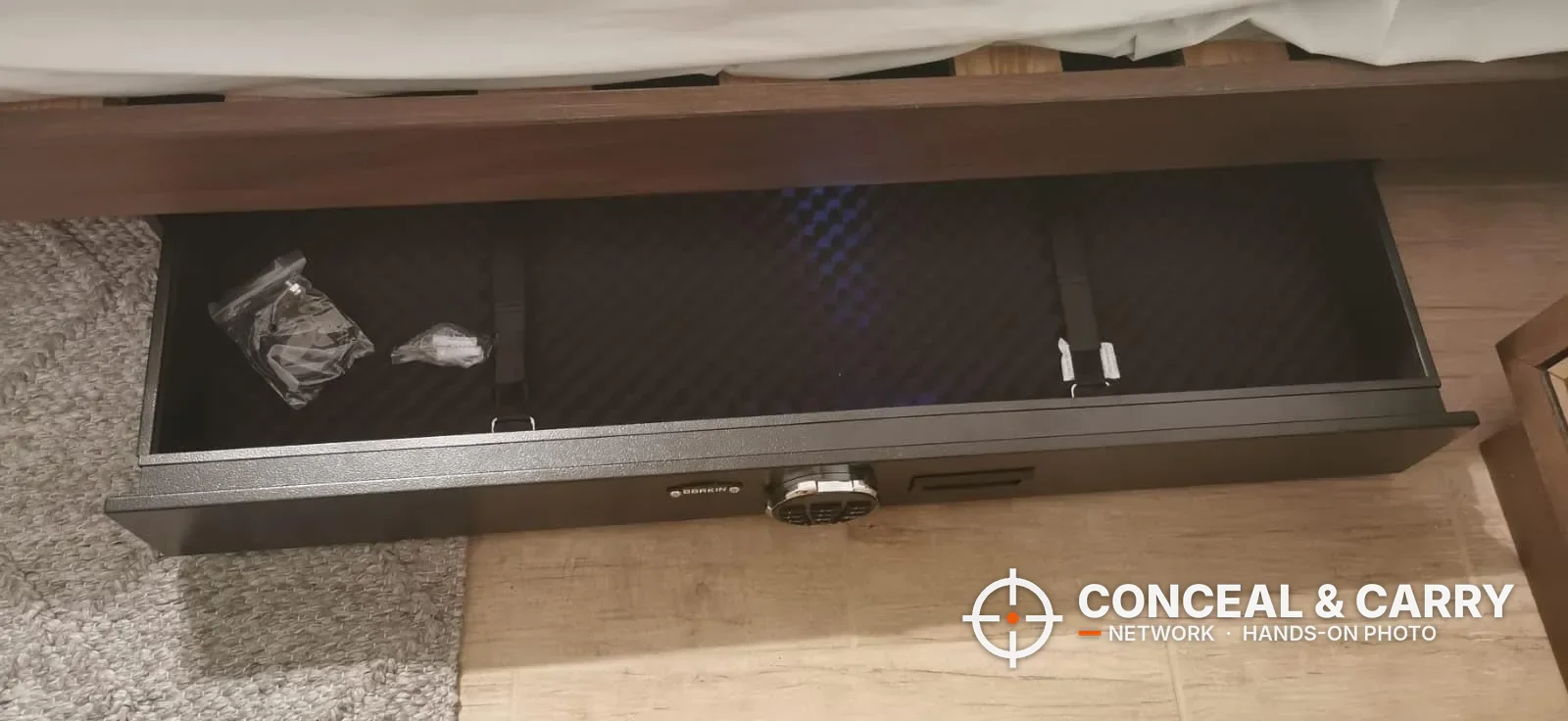 Langger under-bed gun safe drawer pulled out from under a bed