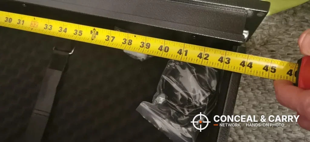 Tape measure run along the inside of the Langger under-bed safe drawer