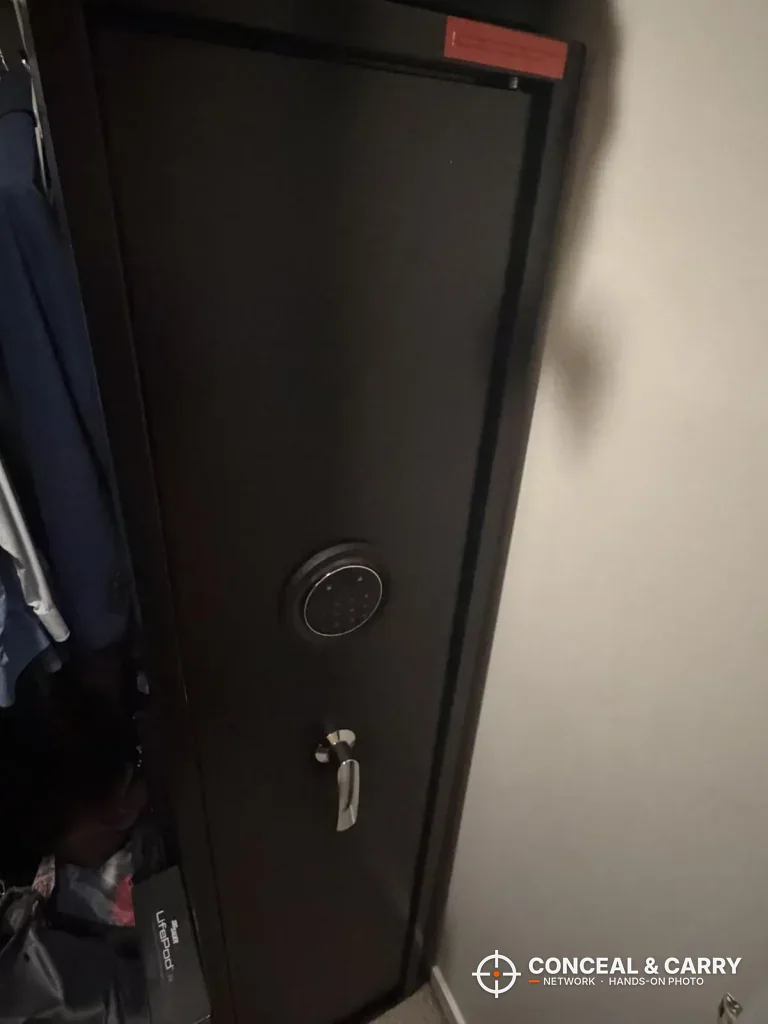 Marcree 8-10 gun safe standing in a room corner with the keypad and handle