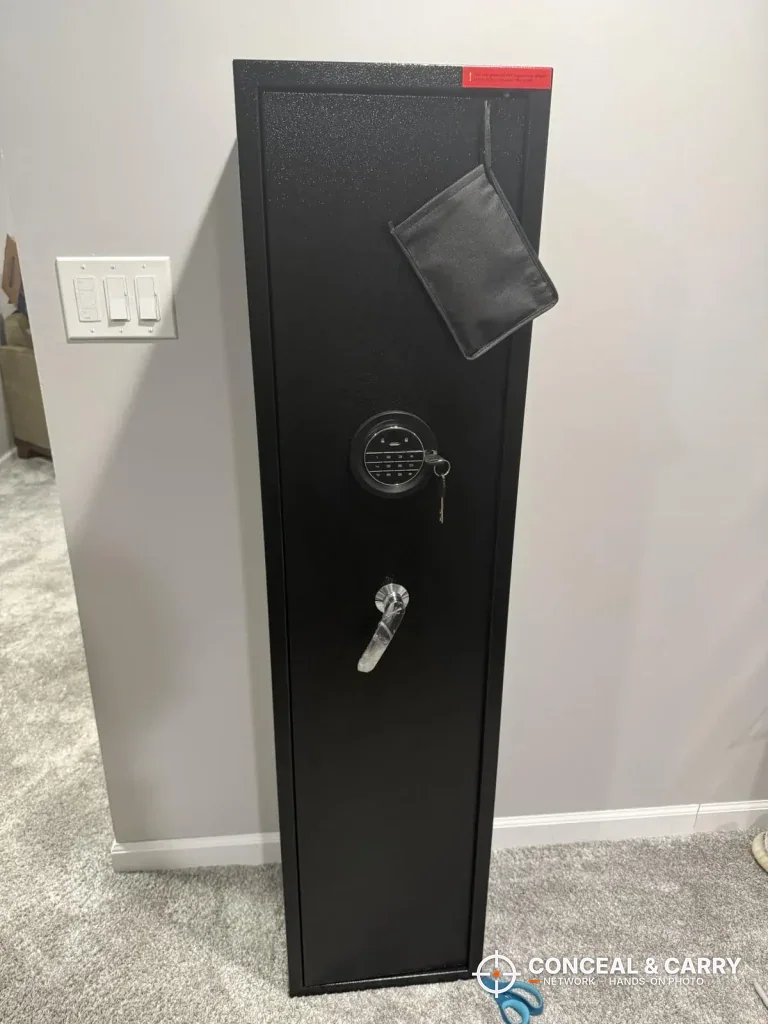 Marcree 8-10 gun safe standing closed against a wall, full front view