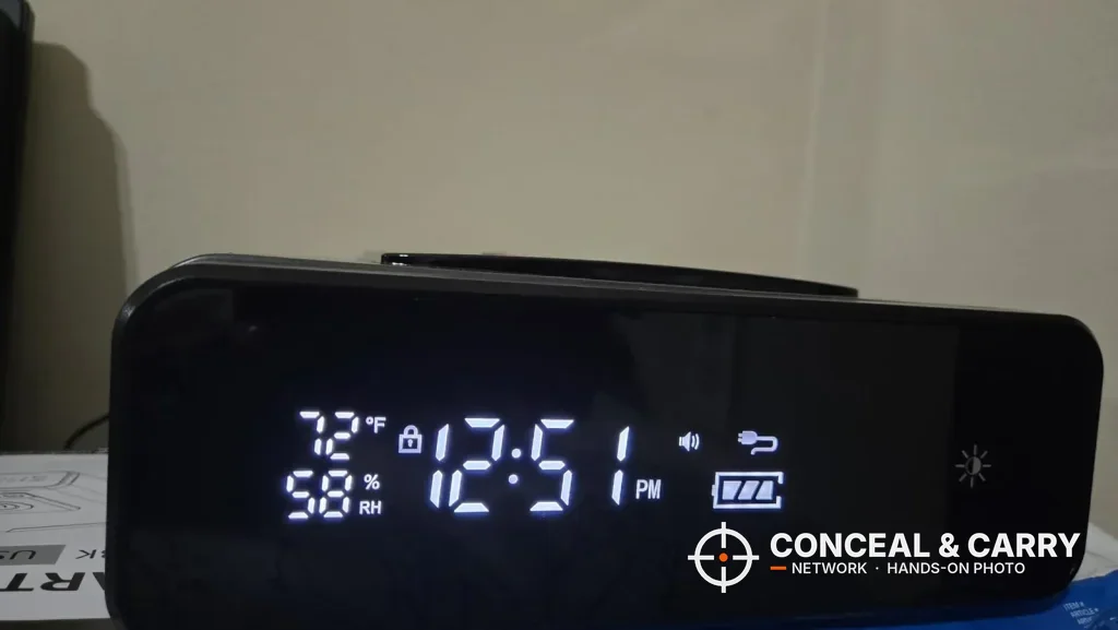 Close-up of the Mboko clock display with time, temperature, humidity and battery level