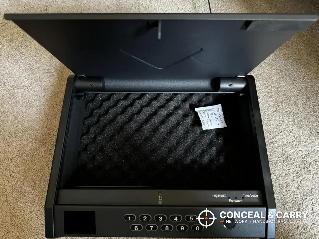 MOLICAR bedside safe lid open showing the foam floor and hinges