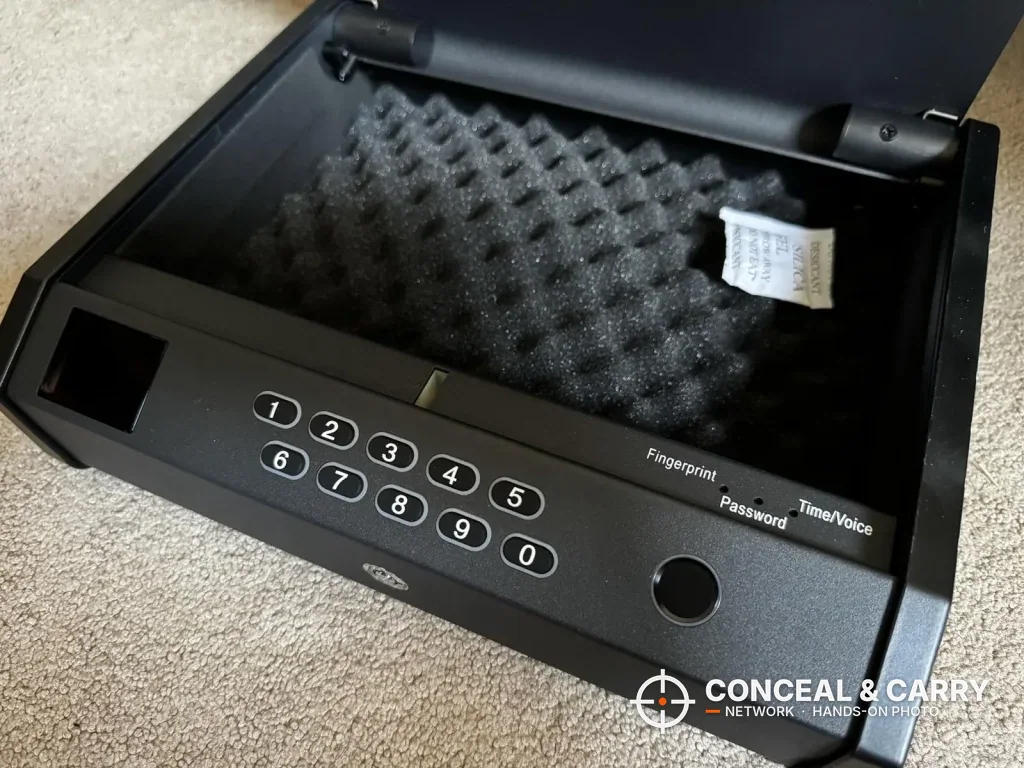 Close-up of the MOLICAR safe keypad, fingerprint reader and button labels