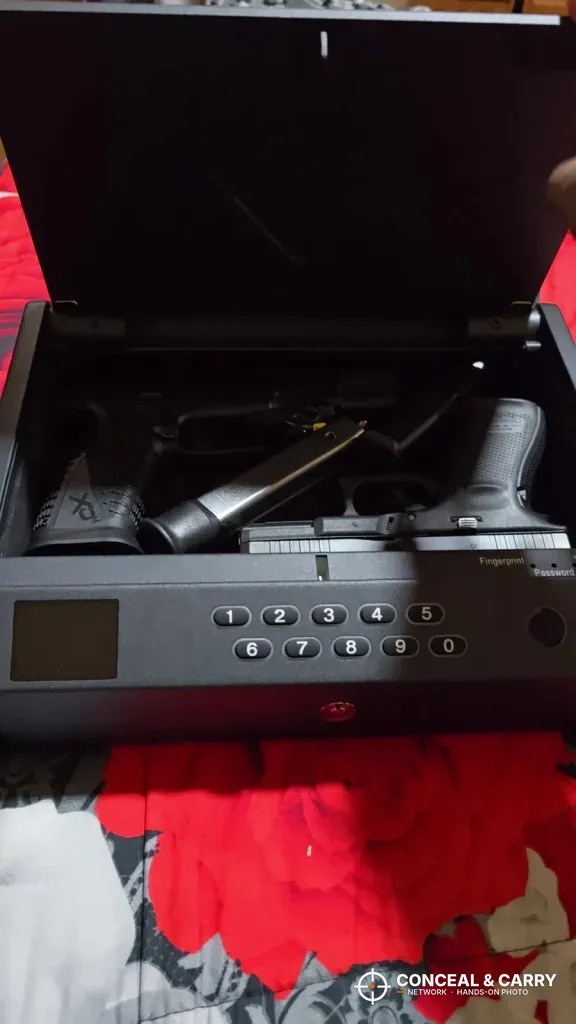 MOLICAR bedside safe loaded with a pistol and spare magazines