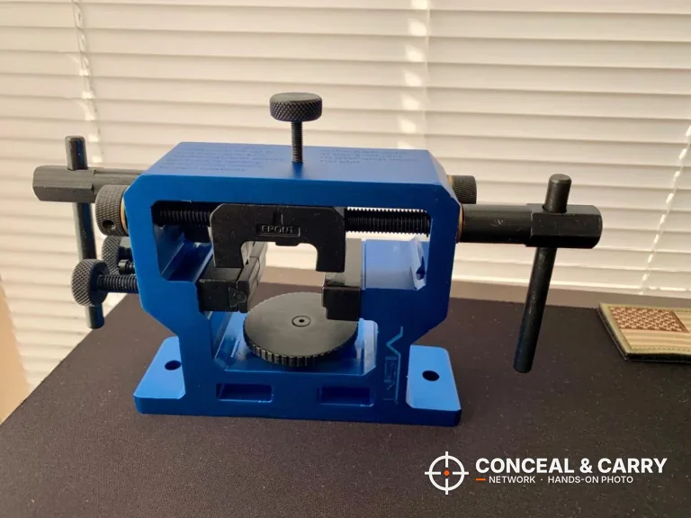 NcSTAR VISM front and rear sight tool standing on a desk