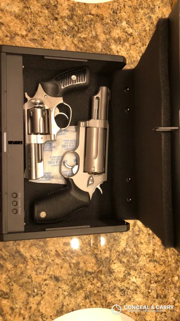 Two revolvers inside the open ONNAIS Iron Pro pistol safe