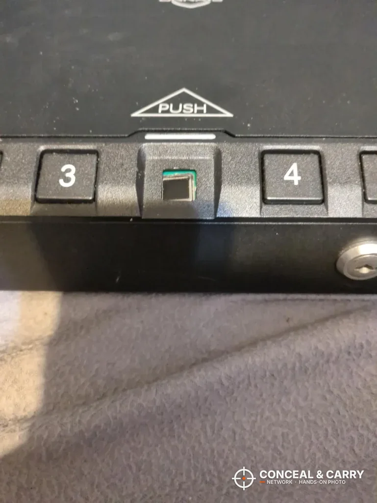 Close-up of the ONNAIS Iron Pro fingerprint reader between the 3 and 4 buttons