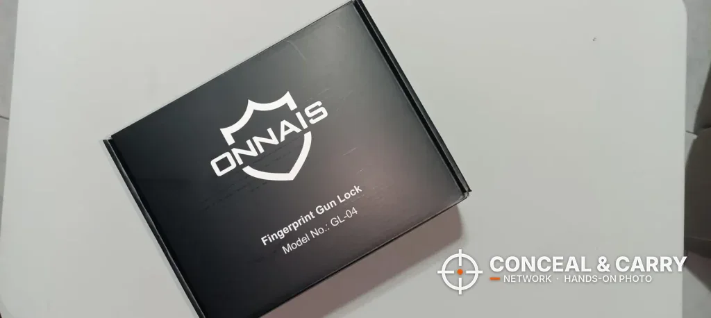 ONNAIS open-design pistol safe retail box labeled Fingerprint Gun Lock