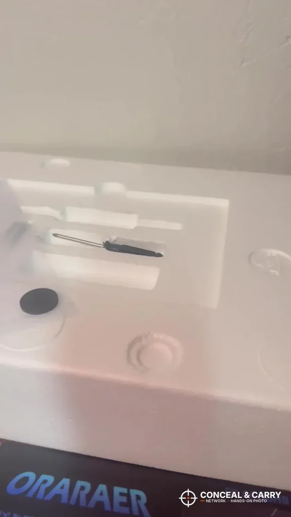 ORARAER branded shipping box with the white foam insert