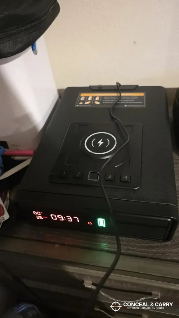 ORARAER safe with its power cord across the top in a dim bedroom