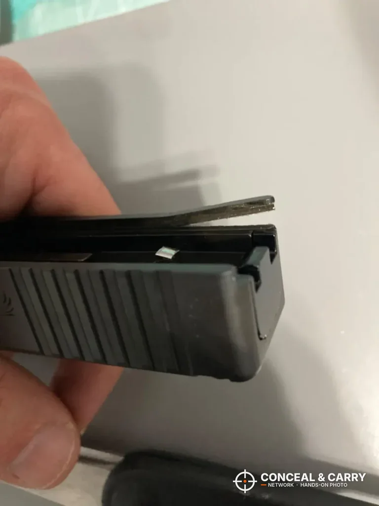 Rear end of a bare Glock slide for work in the Real Avid sight pusher