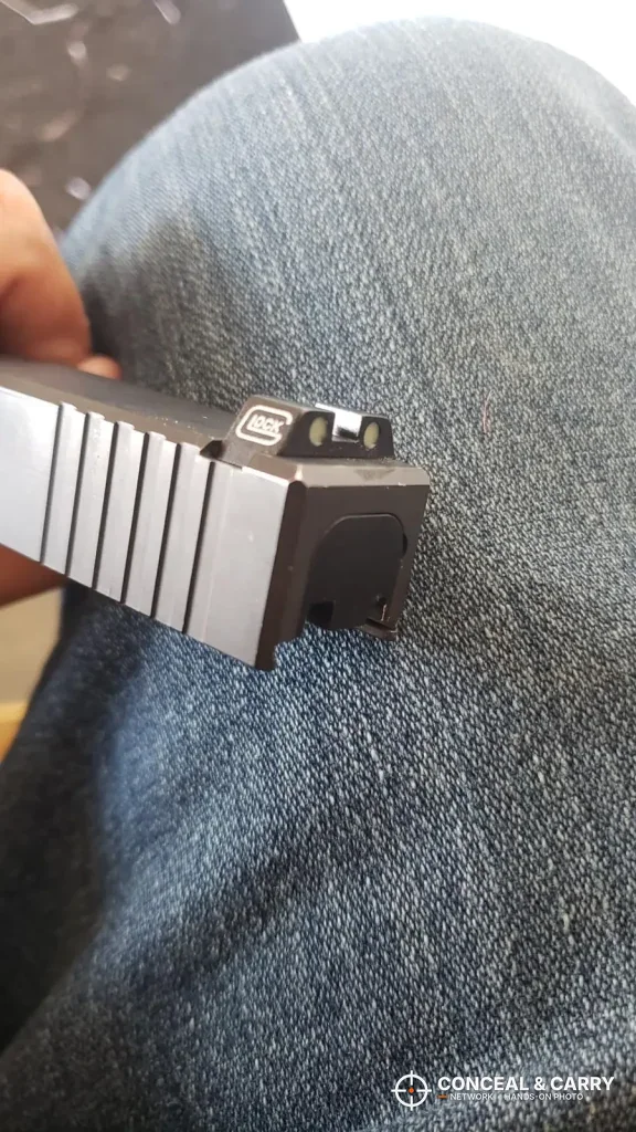 Glock rear sight in the slide dovetail, the job the Real Avid sight pusher is built for
