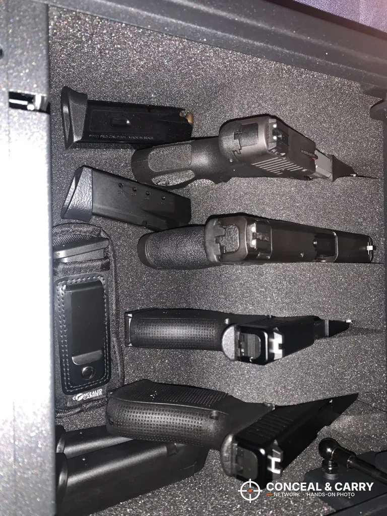 Four pistols racked in the foam of the RPNB 4-pistol safe