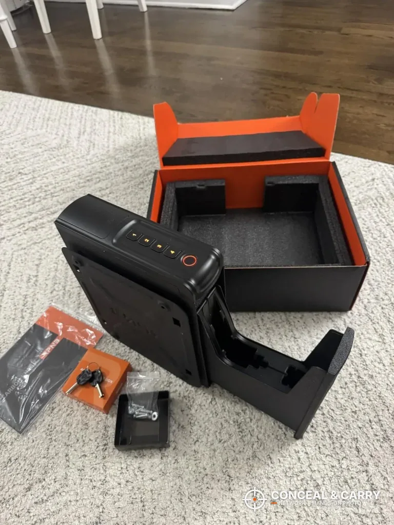 RPNB bedside safe out of its orange-lined box with the drawer partway open