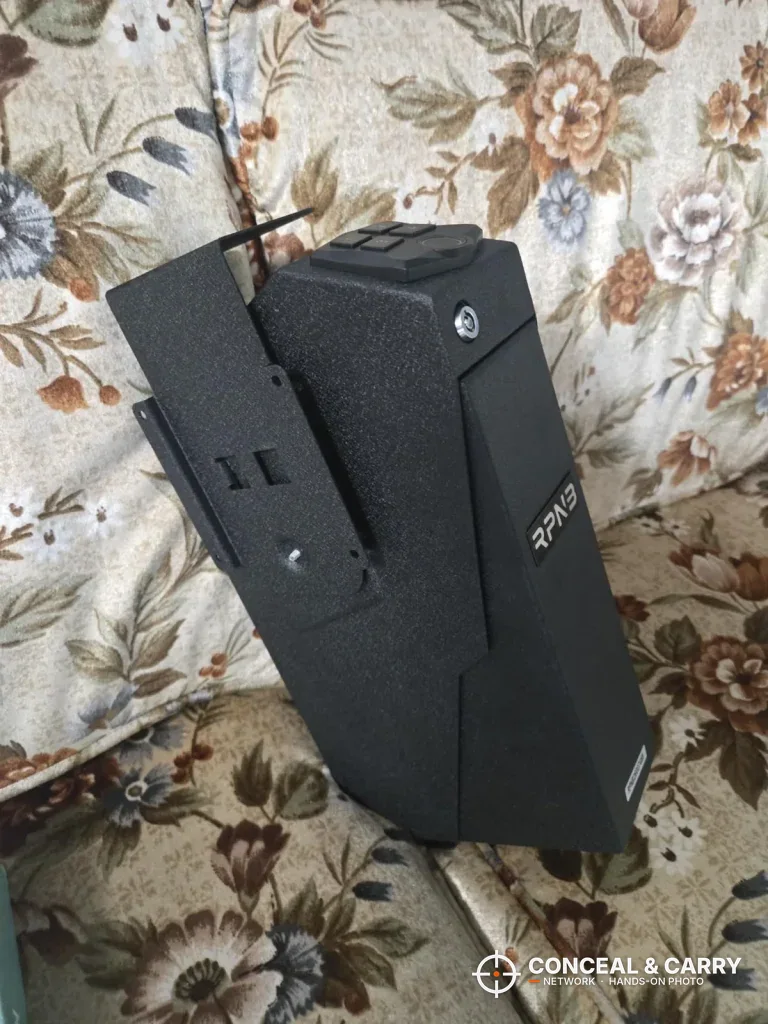 RPNB wall-mounted pistol safe side view with its slotted steel bracket
