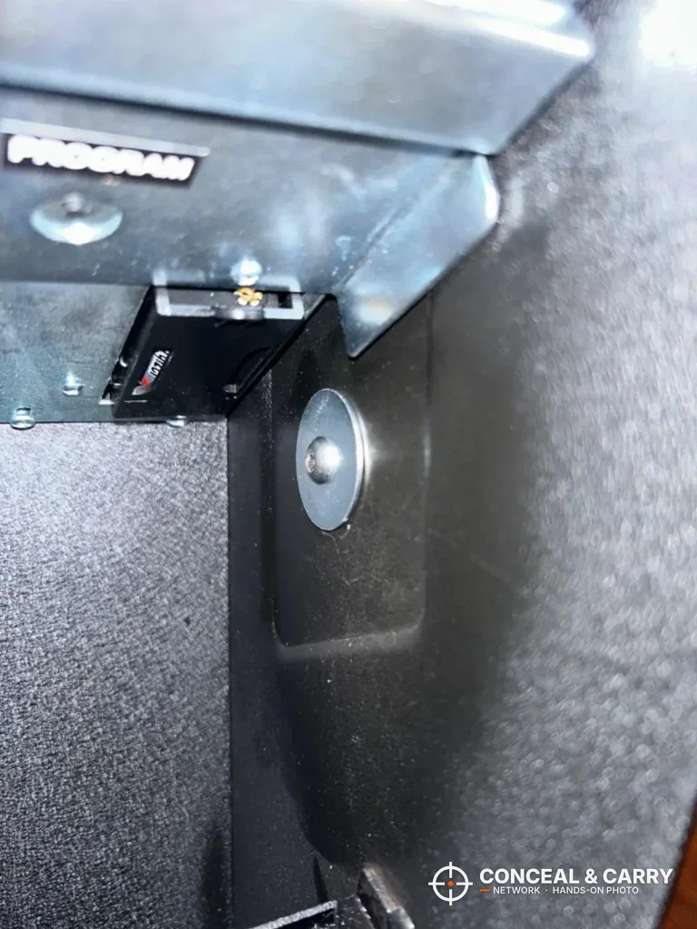 Close-up of the latch inside the top of the RPNB wall-mounted pistol safe