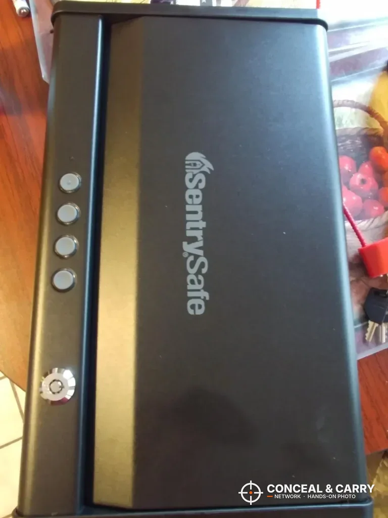 SentrySafe QAP2E closed and standing on end, showing the four-button keypad