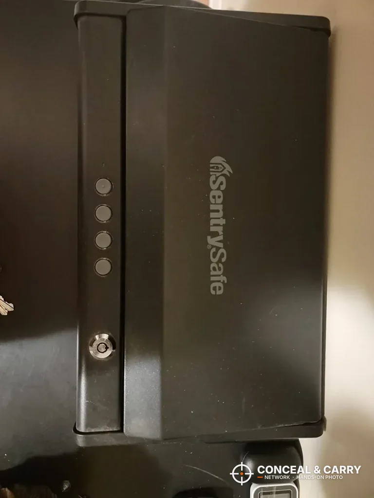 Front of the SentrySafe QAP2E with the logo, keypad and override key lock