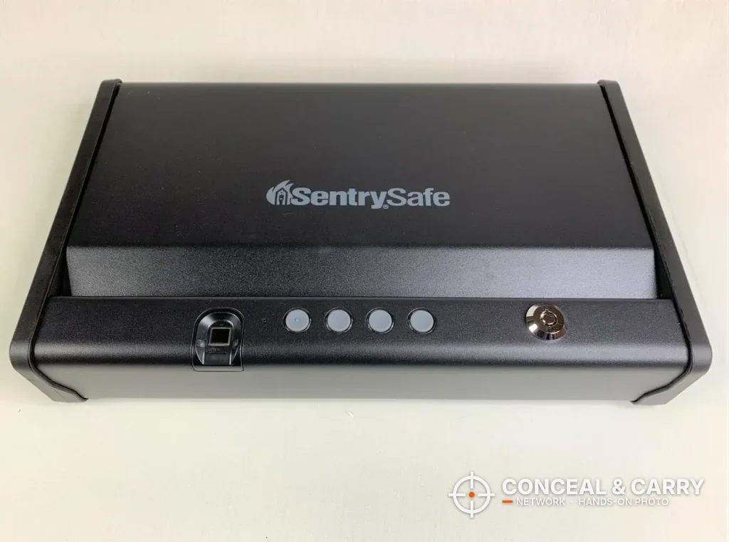 Front of the SentrySafe QAP2BLX with fingerprint reader, four buttons and key lock