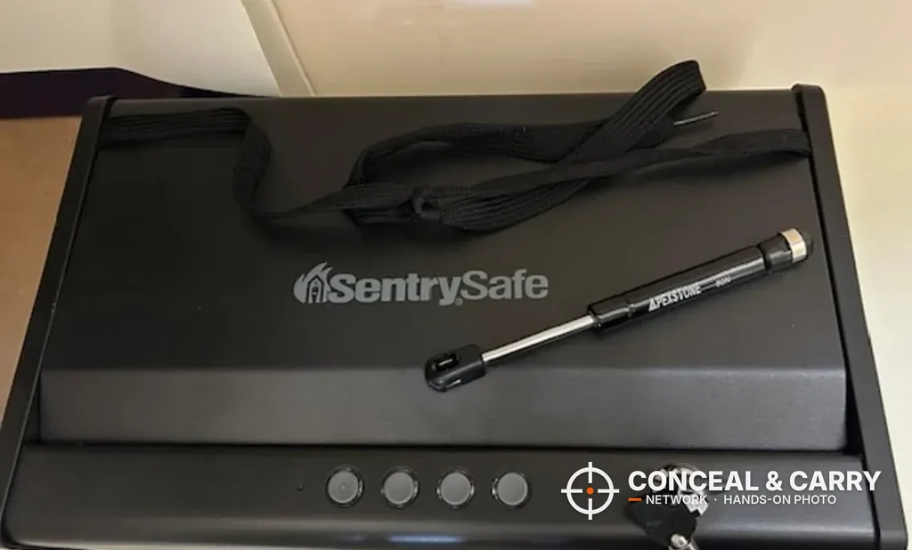 Gas strut lying on top of the closed SentrySafe QAP2BLX