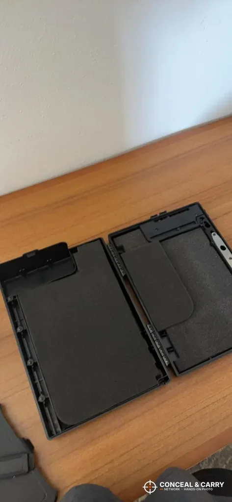 StopBox USA opened flat on a table showing both halves