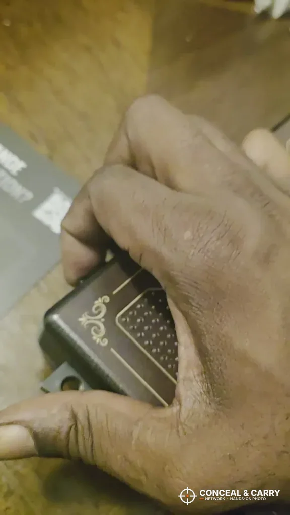 Fingers set on the actuators of a StopBox USA