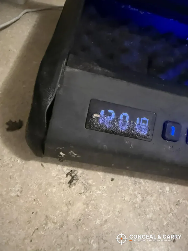 Close-up of the TOPMEDA safe LCD showing the time