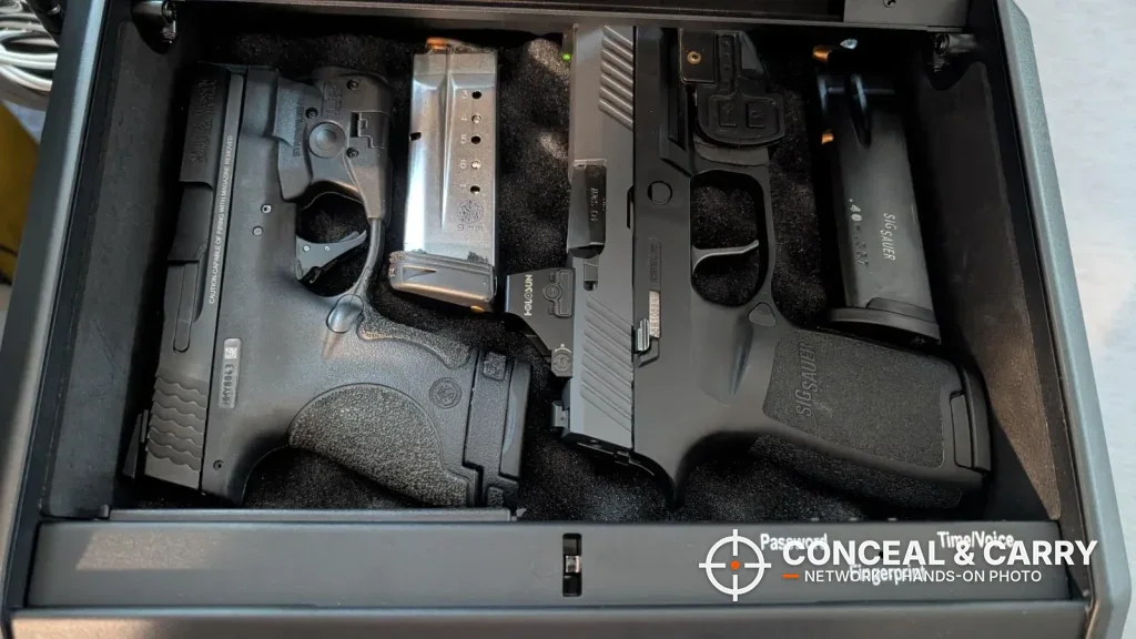 Two pistols and a spare magazine in the TOPMEDA safe foam
