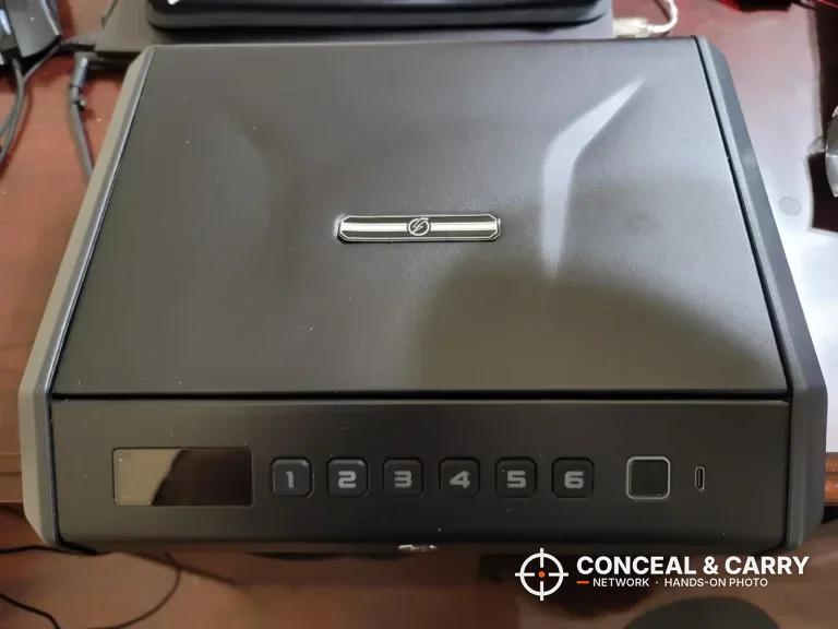 TOPMEDA large biometric pistol safe closed, front view with LCD and keypad