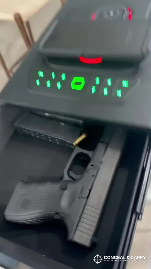 Pistol lying in the open TRRKO safe drawer