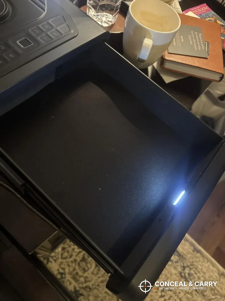 Built-in LED light glowing inside the open TRRKO drawer