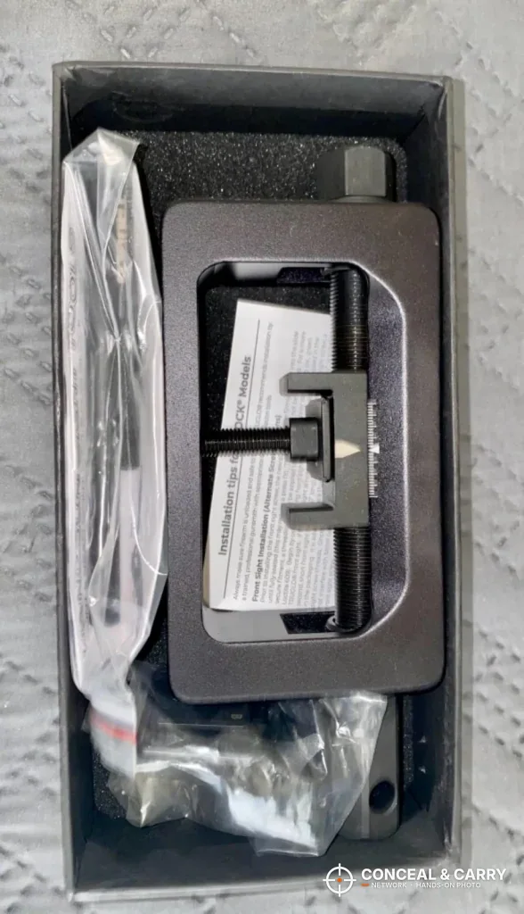 TRUGLO sight tool in its packaging tray with the instruction sheet