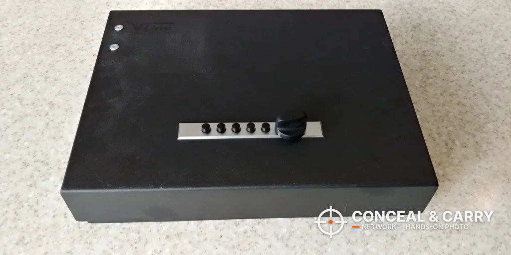 V-Line Top Draw closed on a counter, top view of the lid and lock