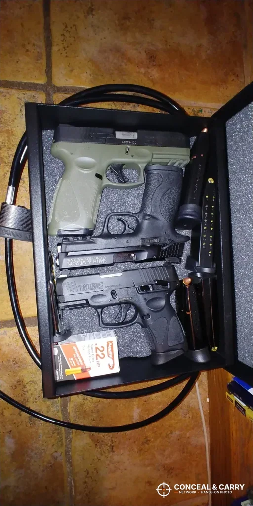 V-Line Top Draw open with two pistols and a coiled cable inside