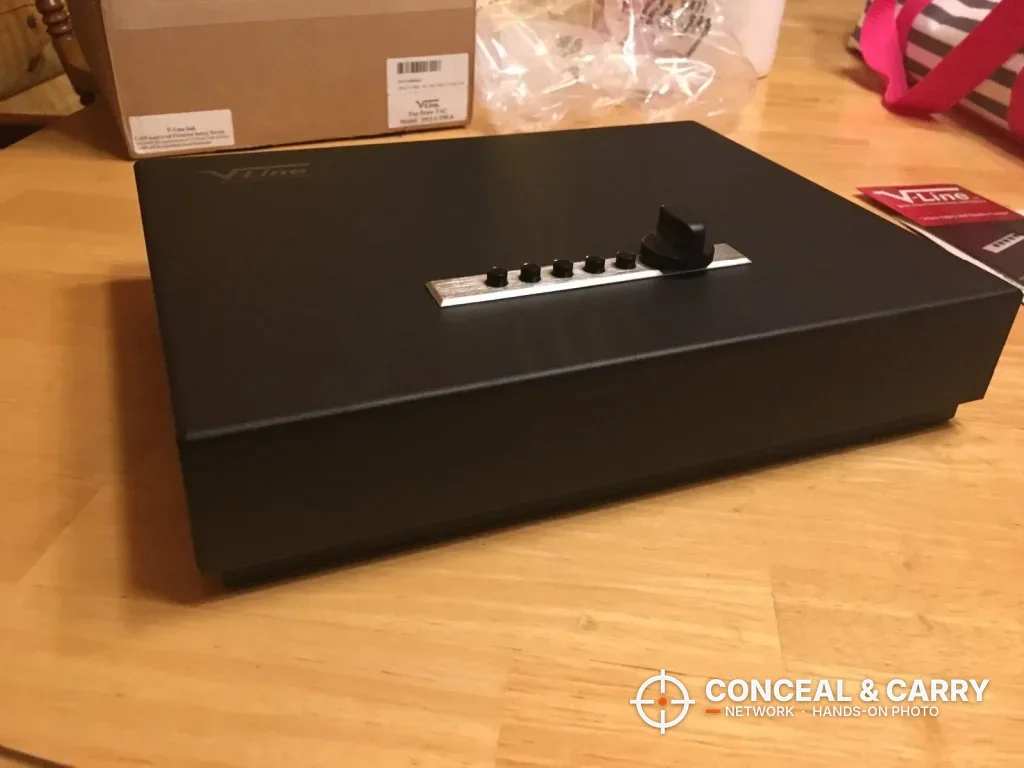 V-Line Top Draw closed on a table with its shipping box behind it