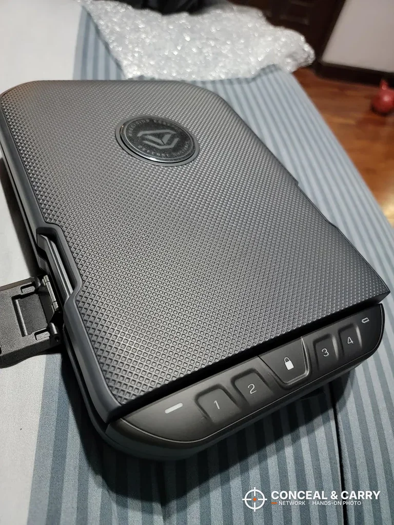 Vaultek LifePod 20 closed, showing the textured lid, front keypad and a side latch