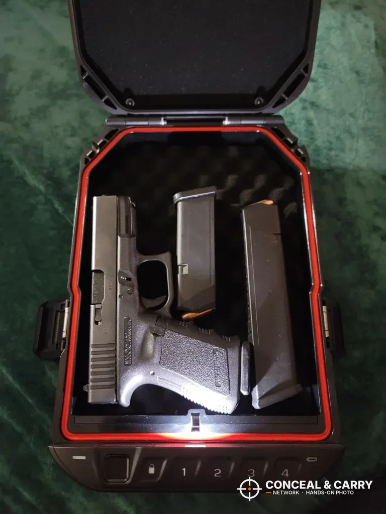 Vaultek LifePod 20 Biometric open with a pistol and two magazines inside