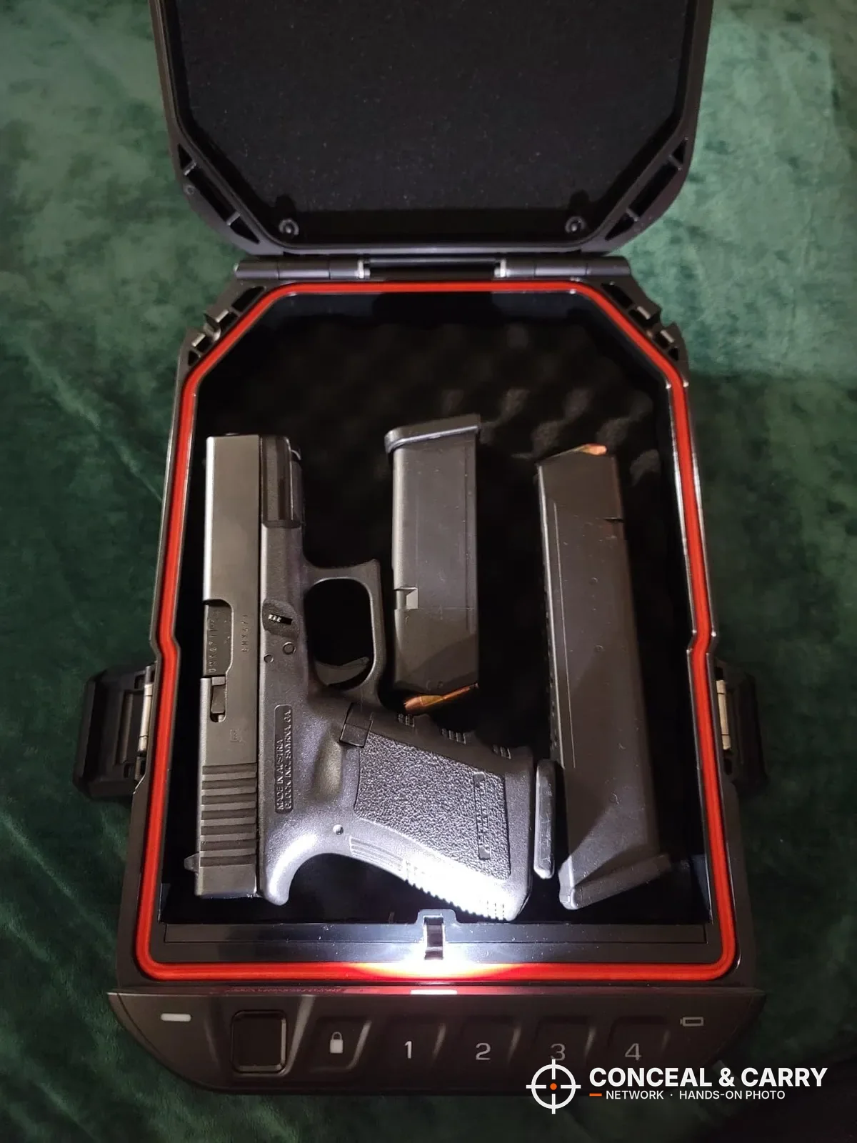 Vaultek LifePod 20 Biometric open with a pistol and two magazines inside