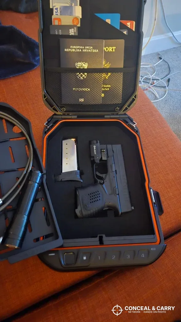 Vaultek LifePod 20 Biometric open with a compact pistol, magazine and lid organizer