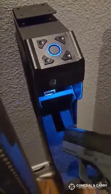 VERPROOF gun safe drawer dropped open under the keypad with a pistol inside