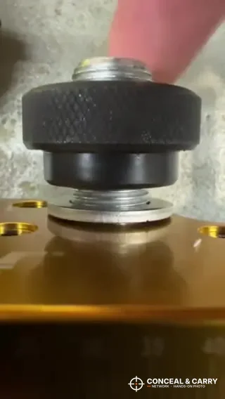 Close-up of a knurled knob on top of the Wheeler sight tool