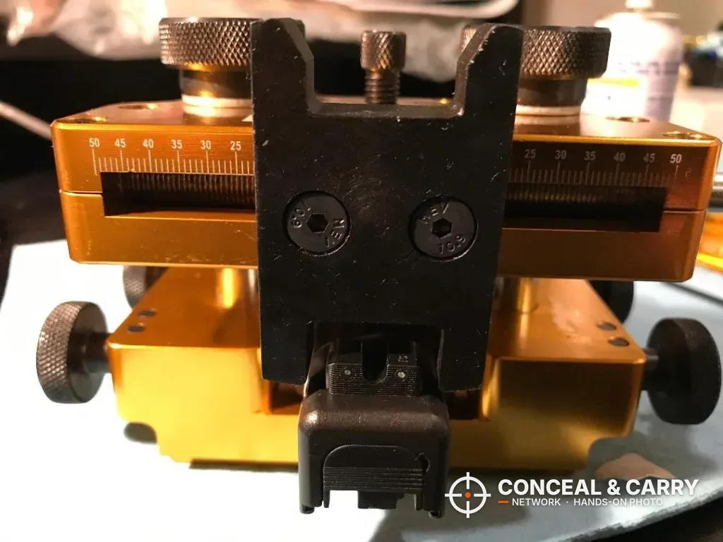 Close-up of the Wheeler sight tool push block, rail scale and clamped slide